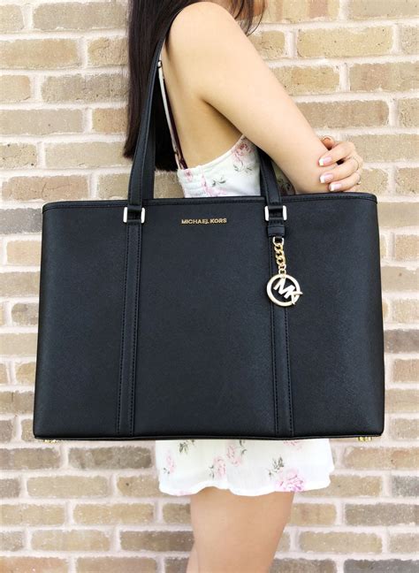 michael kors original bags price|Michael Kors laptop bag.